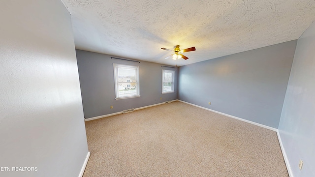 103 Mayfield Dr Unit 5, Elizabethton, TN 37643 - unfurnished room with ceiling fan, a textured ceiling, baseboards, and carpet