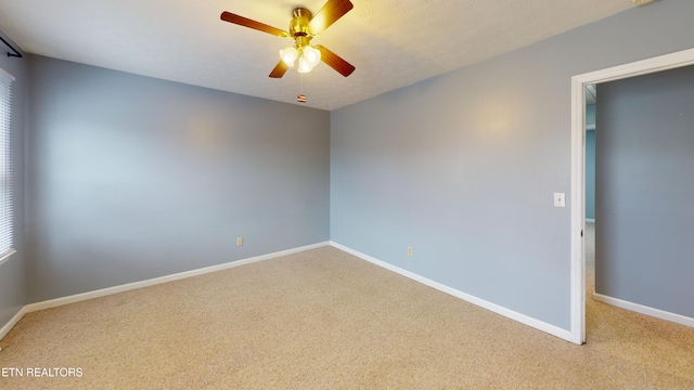 103 Mayfield Dr Unit 5, Elizabethton, TN 37643 - unfurnished room featuring carpet, ceiling fan, and baseboards