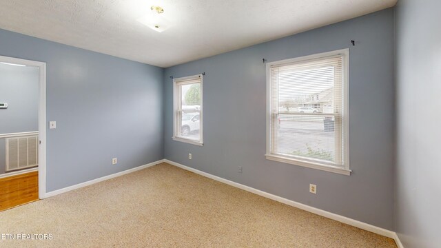 103 Mayfield Dr Unit 5, Elizabethton, TN 37643 - carpeted spare room featuring baseboards