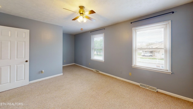 103 Mayfield Dr Unit 5, Elizabethton, TN 37643 - carpeted spare room with ceiling fan and baseboards
