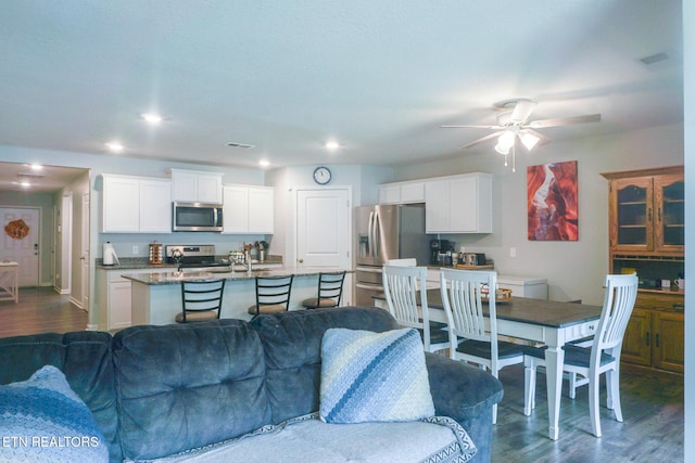 5049 Cottonseed Way, Morristown, TN 37813 - living area featuring dark wood-style floors, a ceiling fan, and recessed lighting