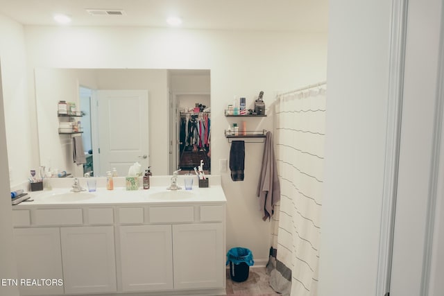 5049 Cottonseed Way, Morristown, TN 37813 - full bath with double vanity, a walk in closet, and curtained shower