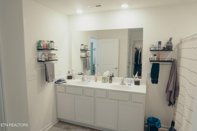 5049 Cottonseed Way, Morristown, TN 37813 - full bathroom featuring double vanity and baseboards