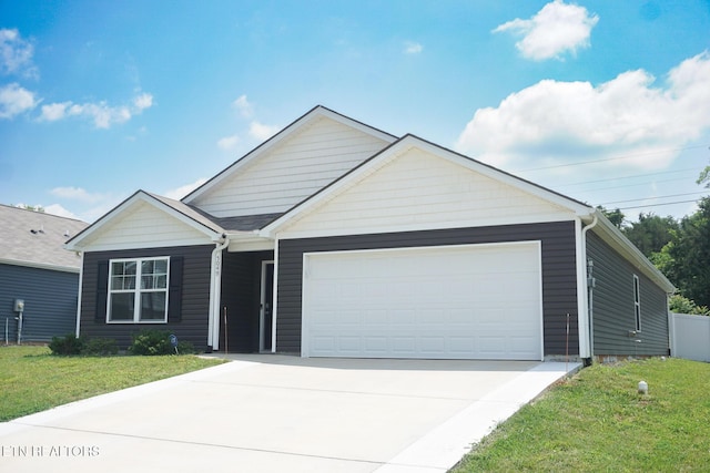 5049 Cottonseed Way, Morristown, TN 37813 - ranch-style home with a front yard, a garage, and driveway