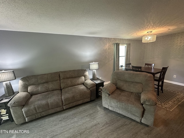 365 Moytoy Rd Unit 103, Crab Orchard, TN 37723 - living room featuring a textured ceiling and wood finished floors