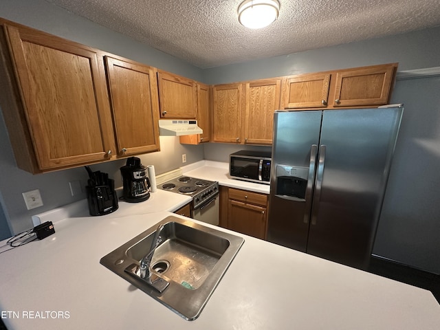 365 Moytoy Rd Unit 103, Crab Orchard, TN 37723 - kitchen featuring fridge with ice dispenser, under cabinet range hood, electric range, light countertops, and a textured ceiling