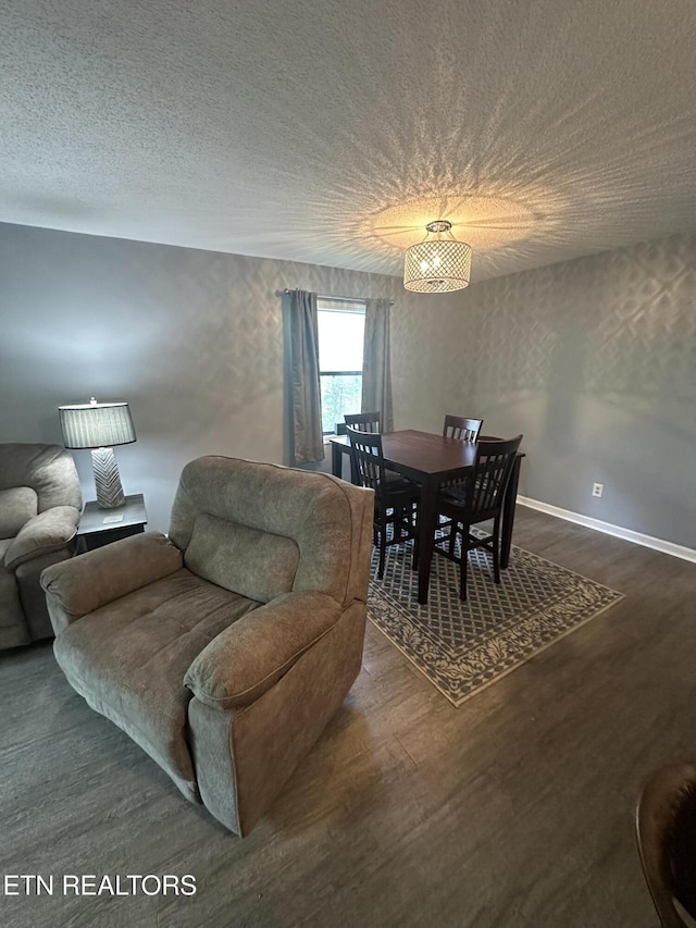 365 Moytoy Rd Unit 103, Crab Orchard, TN 37723 - dining area featuring dark wood-style floors and a textured ceiling