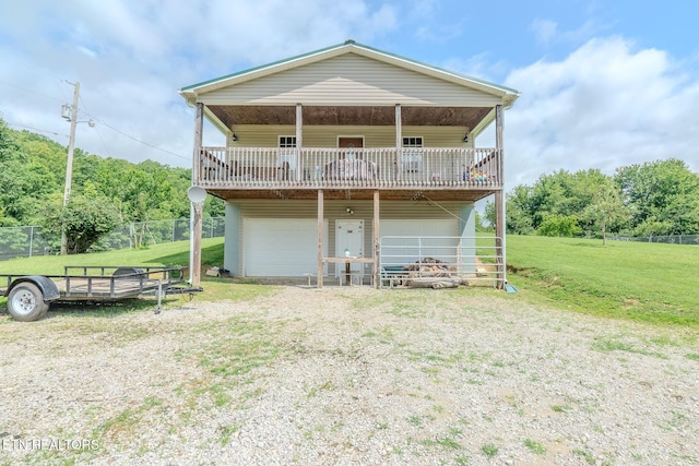 597 Mill Branch Rd, Huntsville, TN 37756 - view of front of house with driveway, a garage, and a deck