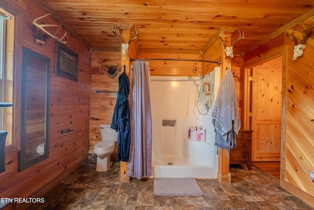 597 Mill Branch Rd, Huntsville, TN 37756 - bathroom featuring wooden walls, wooden ceiling, a stall shower, and stone finish flooring