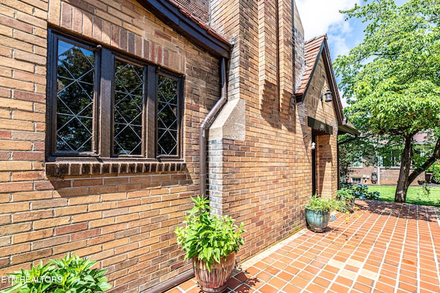 109 Willard St, Maryville, TN 37803 - view of exterior entry featuring a patio area and brick siding