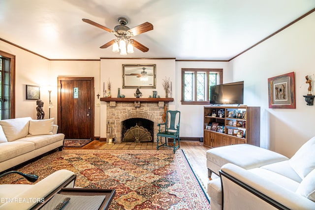 109 Willard St, Maryville, TN 37803 - living room with ceiling fan, wood finished floors, crown molding, a fireplace, and baseboards