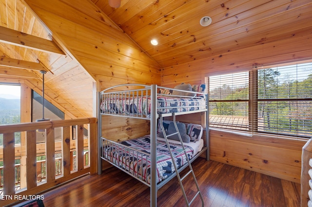 2456 Hackberry Dr, Sevierville, TN 37862 - bedroom featuring lofted ceiling, wood ceiling, wood walls, and hardwood / wood-style flooring