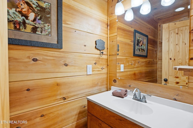 2456 Hackberry Dr, Sevierville, TN 37862 - bathroom with vanity and wooden walls