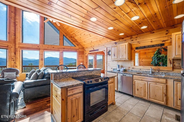 2456 Hackberry Dr, Sevierville, TN 37862 - kitchen with black electric range oven, stainless steel dishwasher, a mountain view, wood ceiling, and wooden walls