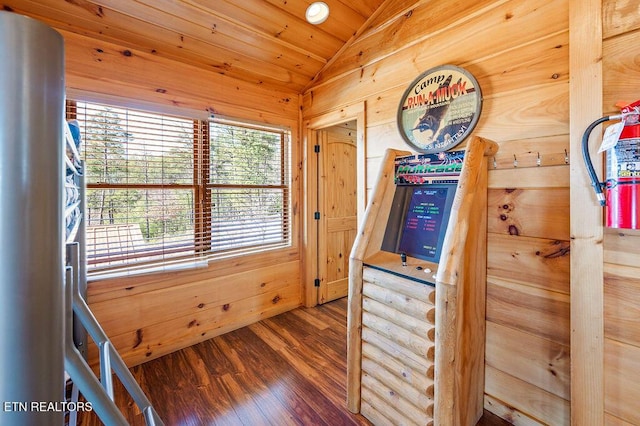 2456 Hackberry Dr, Sevierville, TN 37862 - hallway with lofted ceiling, wood finished floors, wooden ceiling, and wooden walls