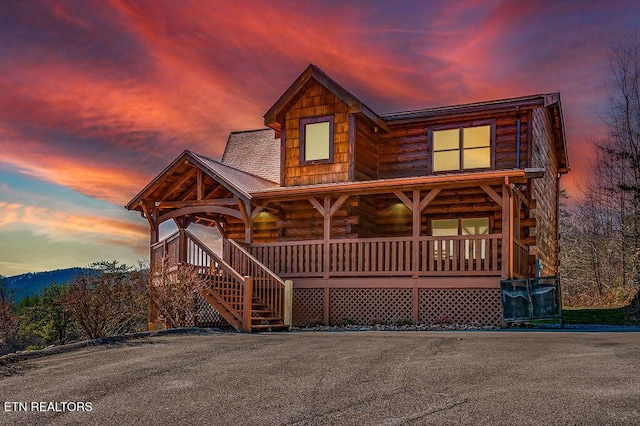 2456 Hackberry Dr, Sevierville, TN 37862 - view of front of home with a porch and log siding