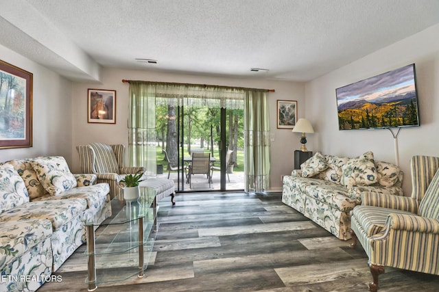 99 Wilshire Heights Dr Unit 99, Crossville, TN 38558 - living room with a textured ceiling and wood finished floors