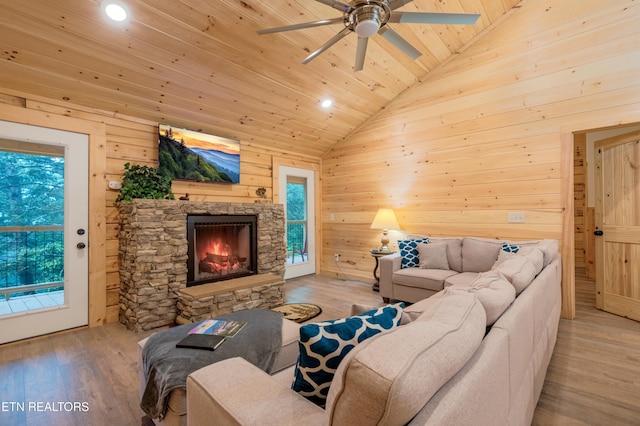 1646 Misty Hollow Way, Gatlinburg, TN 37738 - living area with vaulted ceiling, a ceiling fan, wood ceiling, wood finished floors, and wooden walls