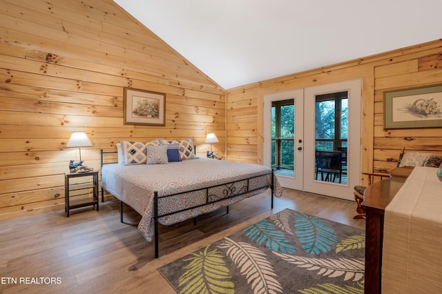 1646 Misty Hollow Way, Gatlinburg, TN 37738 - bedroom with access to outside, wood walls, vaulted ceiling, and wood finished floors