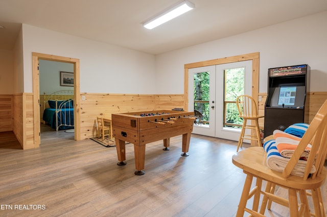 1646 Misty Hollow Way, Gatlinburg, TN 37738 - recreation room featuring a wainscoted wall, french doors, wood finished floors, and wood walls