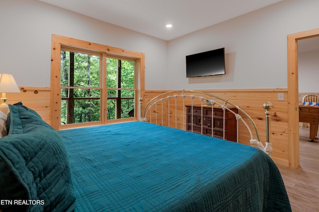 1646 Misty Hollow Way, Gatlinburg, TN 37738 - bedroom featuring wainscoting, wood finished floors, wooden walls, and recessed lighting