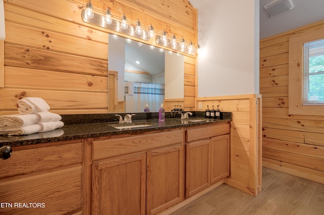 1646 Misty Hollow Way, Gatlinburg, TN 37738 - full bathroom featuring wooden walls, double vanity, and lofted ceiling