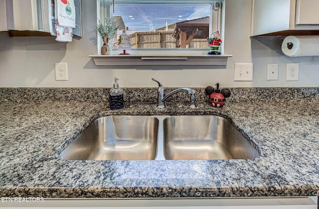 812 Greene Meadow Dr, Talbott, TN 37877 - kitchen view of a sink and dark stone counters