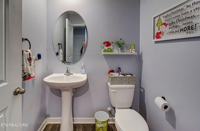 812 Greene Meadow Dr, Talbott, TN 37877 - bathroom featuring toilet, wood finished floors, and baseboards