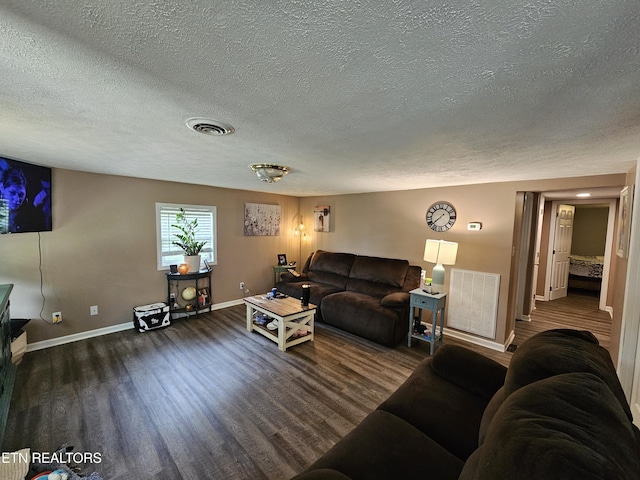 717 Cedar Fork Rd, Tazewell, TN 37879 - living area with a textured ceiling, wood finished floors, and baseboards