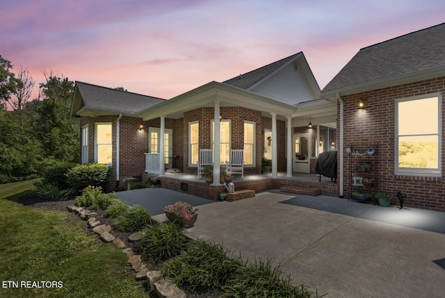 4151 Cave Springs Rd, Tazewell, TN 37879 - rear view of property with a porch and brick siding