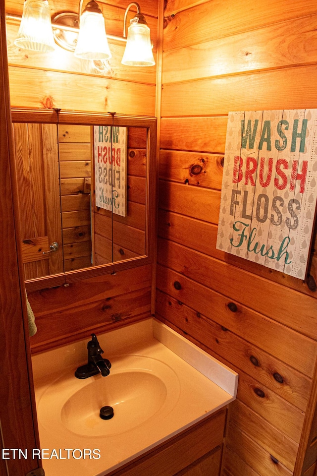 2277 Old Wolf River Rd, Jamestown, TN 38556 - bathroom featuring vanity and wooden walls