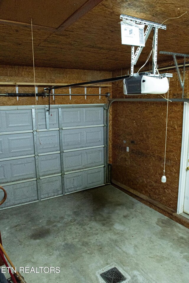 2277 Old Wolf River Rd, Jamestown, TN 38556 - garage with a garage door opener