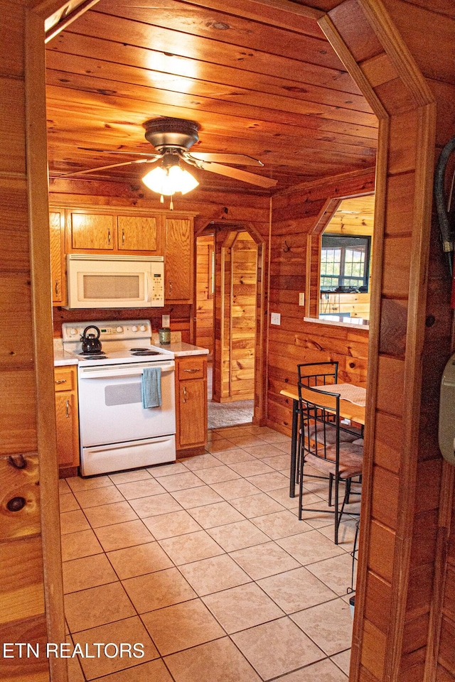 2277 Old Wolf River Rd, Jamestown, TN 38556 - kitchen with white appliances, wood ceiling, a ceiling fan, light tile patterned floors, and light countertops