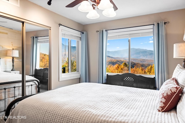 3710 Weber Rd Unit E107, Gatlinburg, TN 37738 - bedroom with a mountain view and a ceiling fan