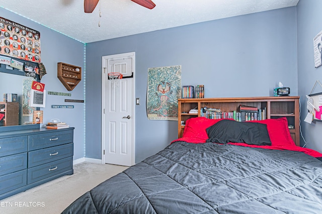117 Maltese Ln, Oak Ridge, TN 37830 - carpeted bedroom with a textured ceiling, baseboards, and ceiling fan