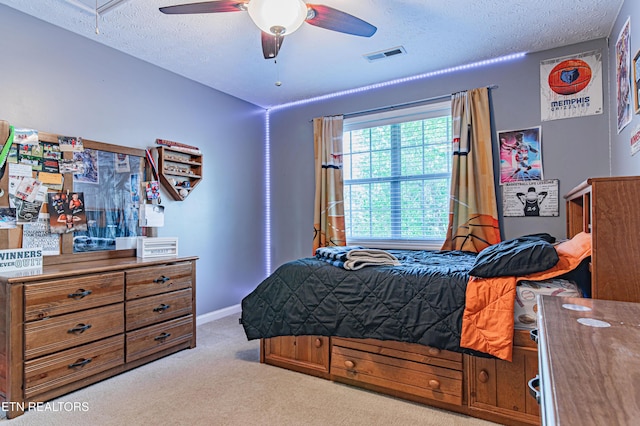 117 Maltese Ln, Oak Ridge, TN 37830 - bedroom with light colored carpet, a textured ceiling, attic access, baseboards, and a ceiling fan