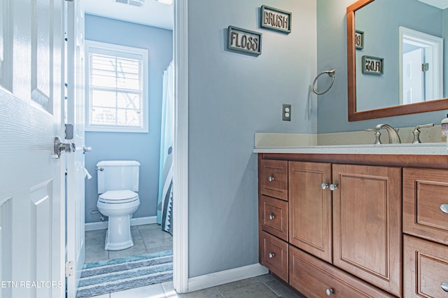117 Maltese Ln, Oak Ridge, TN 37830 - full bathroom with toilet, vanity, baseboards, and tile patterned floors