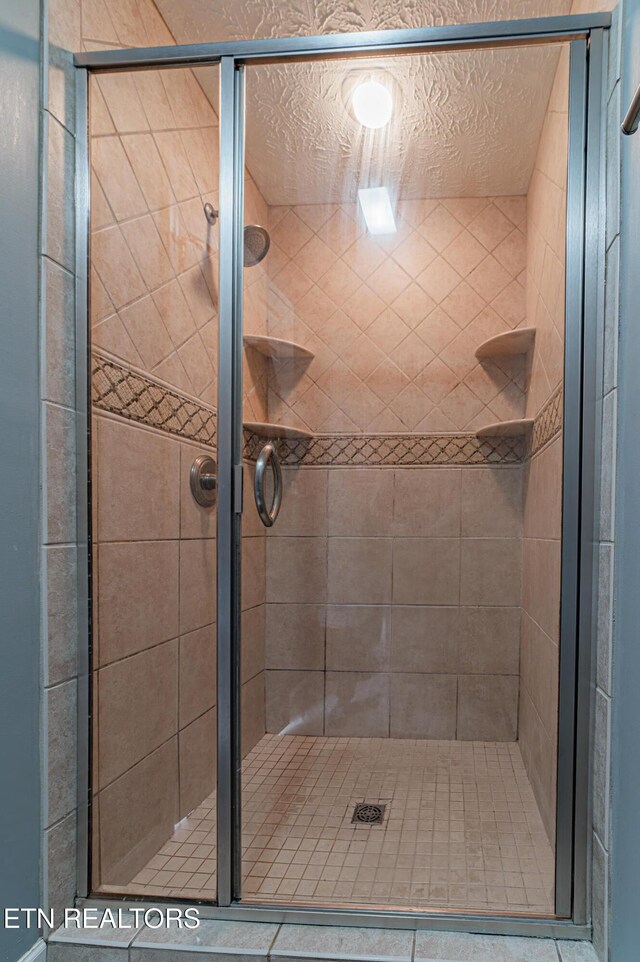 117 Maltese Ln, Oak Ridge, TN 37830 - bathroom with a stall shower and tile patterned flooring