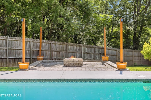 9005 Carlton Cir, Knoxville, TN 37922 - view of swimming pool featuring an outdoor fire pit and a patio