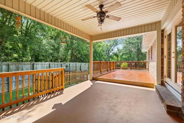 9005 Carlton Cir, Knoxville, TN 37922 - fenced backyard with a ceiling fan and a patio