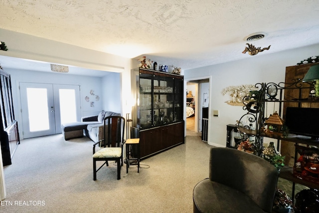 2645 Mountain View Dr, Morristown, TN 37814 - living area with french doors and a textured ceiling