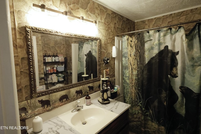 2645 Mountain View Dr, Morristown, TN 37814 - bathroom featuring vanity, a shower with shower curtain, a textured ceiling, and ornamental molding