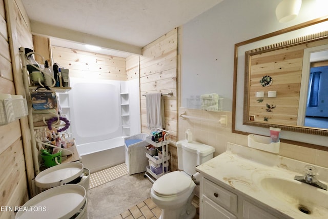 2645 Mountain View Dr, Morristown, TN 37814 - full bath with toilet, vanity, tile walls, and  shower combination