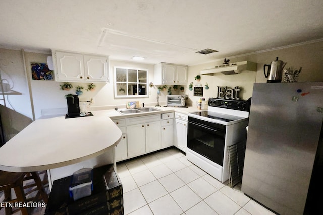 2645 Mountain View Dr, Morristown, TN 37814 - kitchen featuring freestanding refrigerator, electric range, under cabinet range hood, light tile patterned floors, and a sink