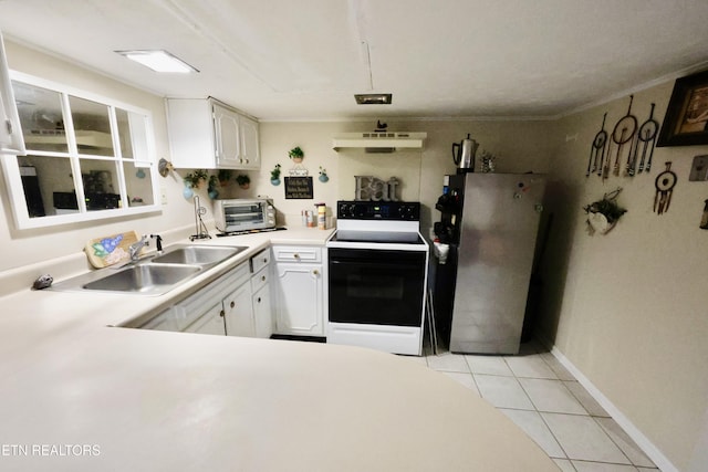 2645 Mountain View Dr, Morristown, TN 37814 - kitchen with range with electric stovetop, freestanding refrigerator, under cabinet range hood, a sink, and light tile patterned floors