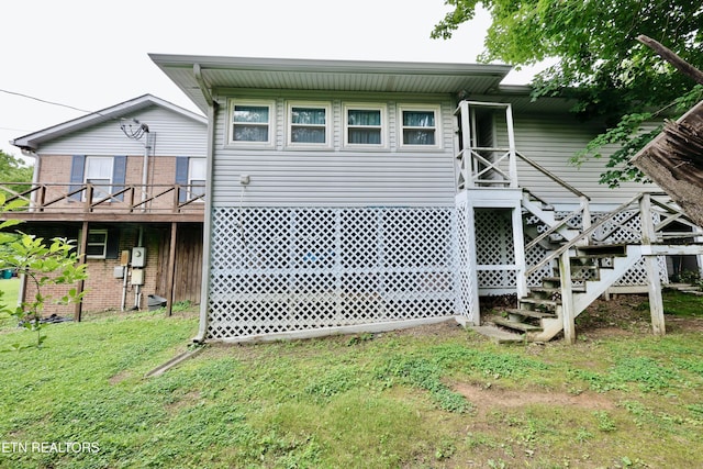 2645 Mountain View Dr, Morristown, TN 37814 - rear view of house with stairway, a deck, and brick siding