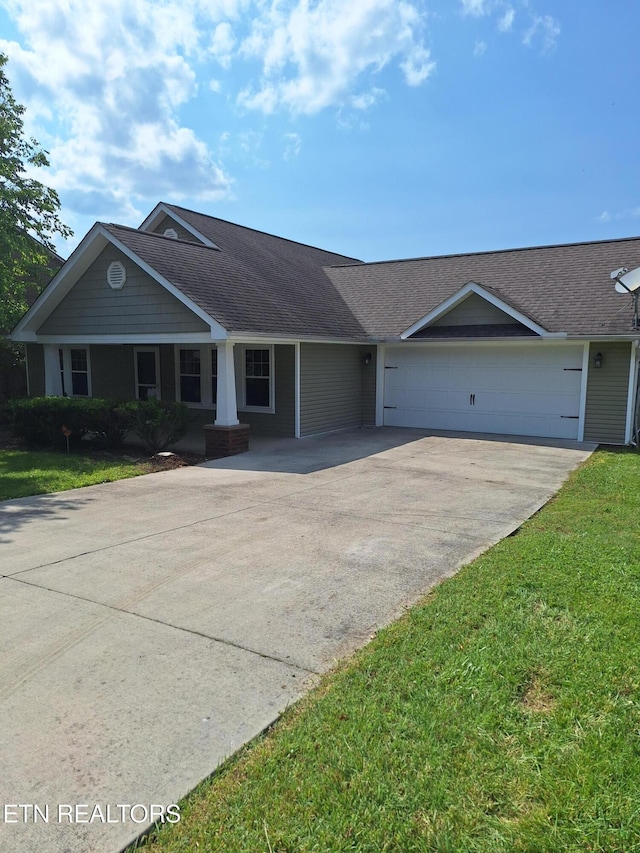 7739 Applecross Rd, Corryton, TN 37721 - single story home featuring driveway, a garage, and a front lawn