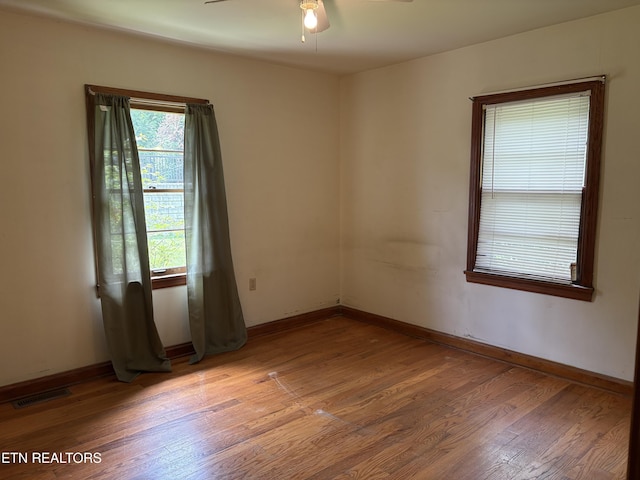 306 S Cedar St, Maryville, TN 37803 - spare room with a ceiling fan, light wood finished floors, and baseboards
