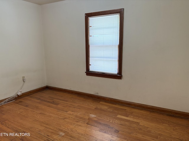 306 S Cedar St, Maryville, TN 37803 - unfurnished room with light wood-style flooring and baseboards