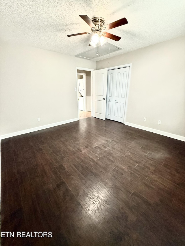 304 Douglas Ave, Knoxville, TN 37921 - spare room with dark wood-type flooring, a ceiling fan, baseboards, and a textured ceiling